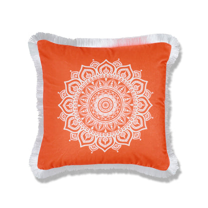 Plush orange velvet cushion with white mandala and white fringe trim