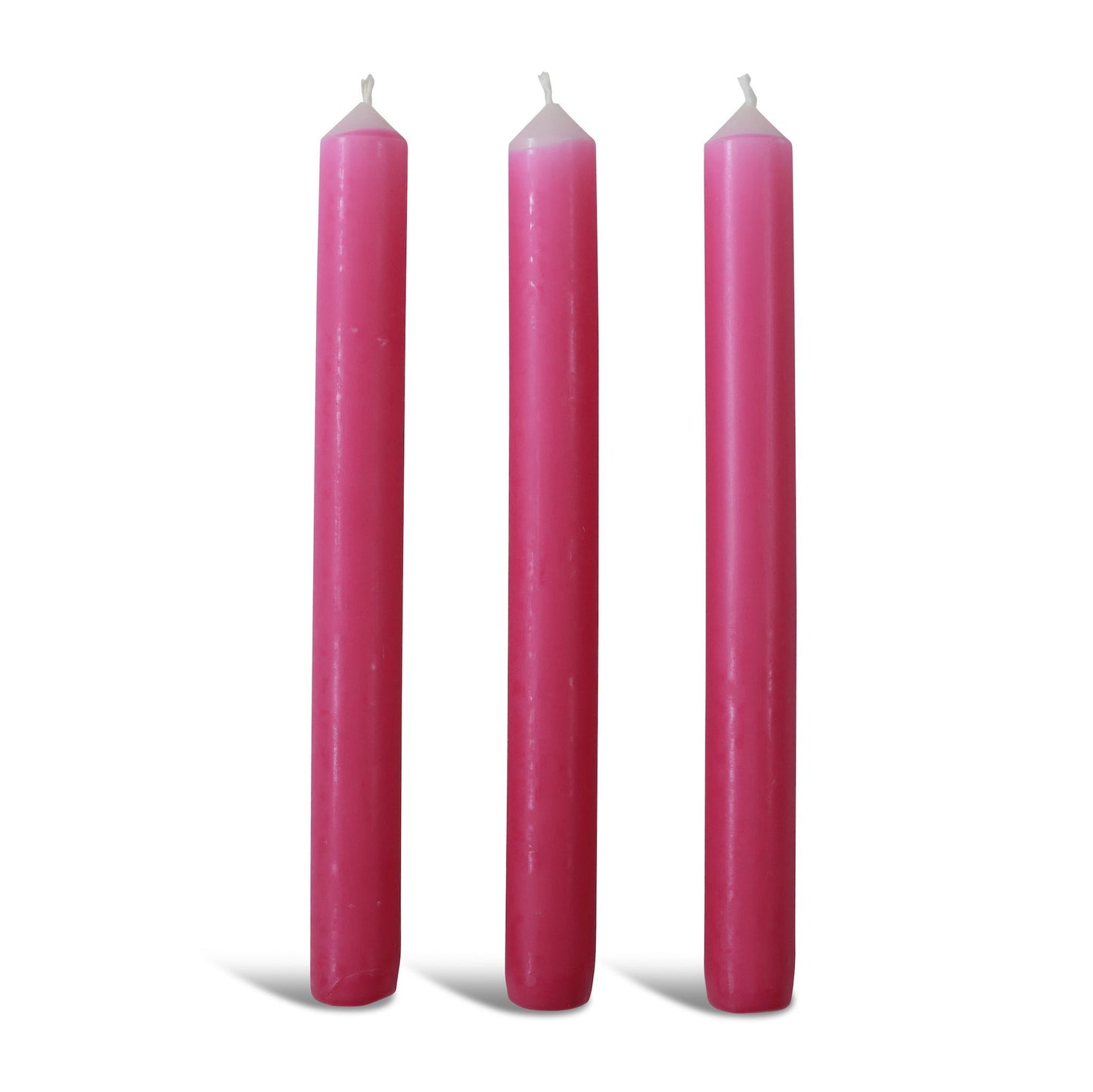 Three pink dinner candles