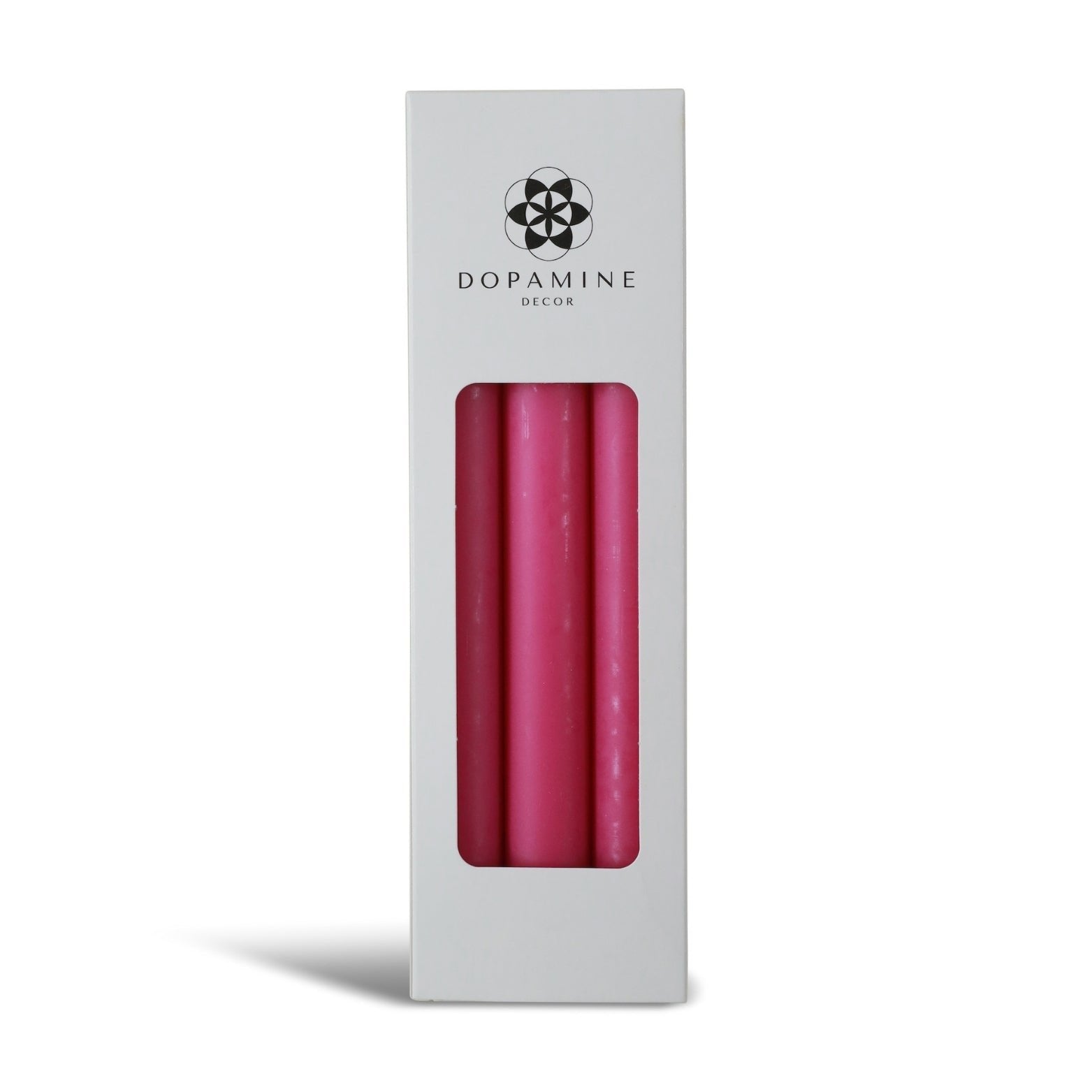 Dopamine Decor pink dinner taper candles in a Dopamine Decor packaging on a white background